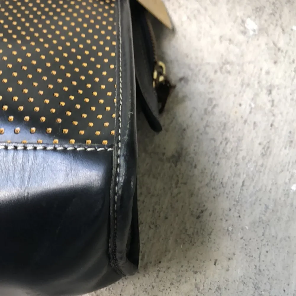 Dooney & Bourke Perforated polkadot bag